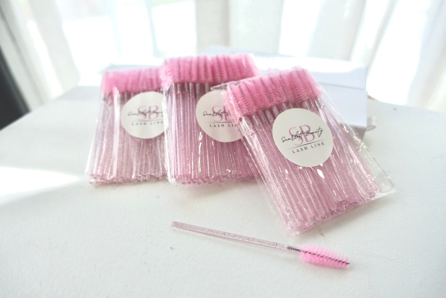 Lash Wands are an essential tool for lash artists and clients, designed to gently brush and maintain lash extensions.