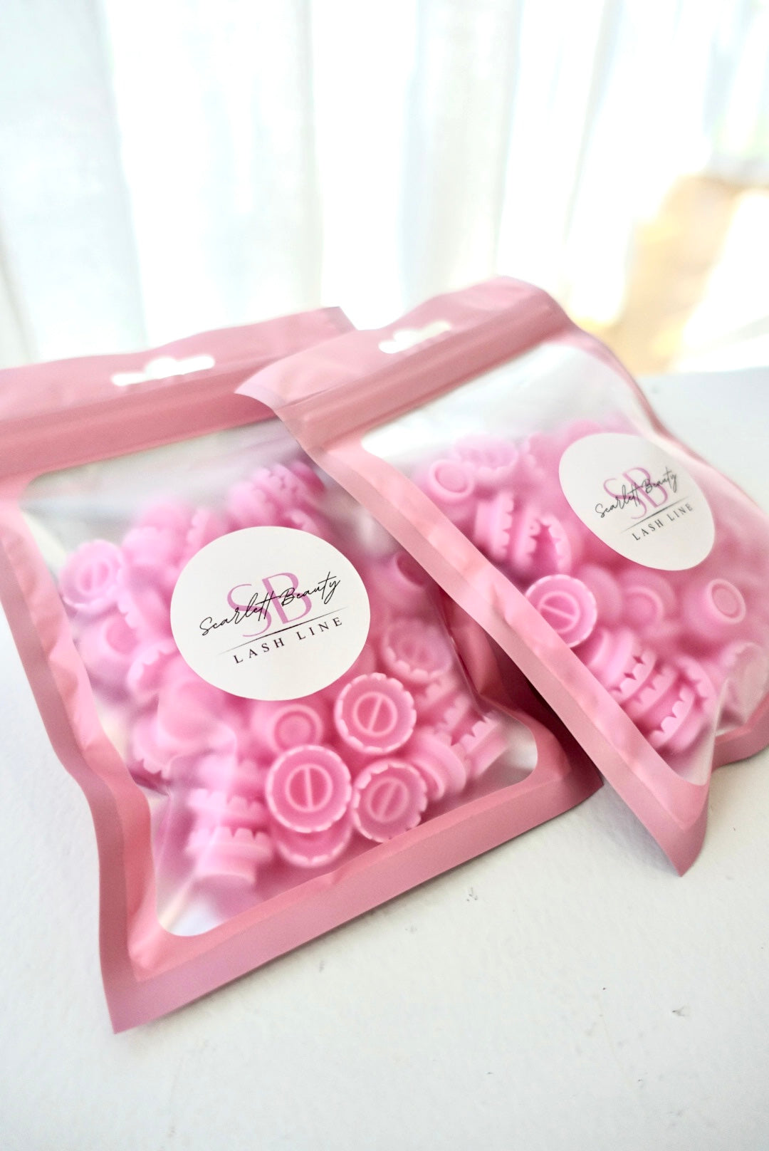 Blossom Cups are specially designed adhesive cups that help maintain glue freshness while creating the perfect surface for volume fan pickup.