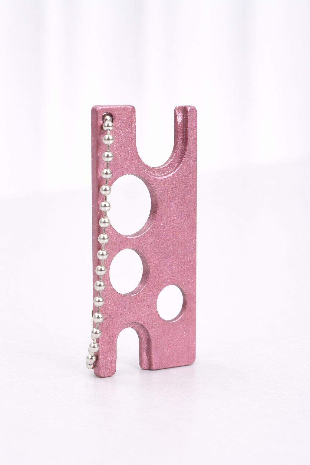 The Glue Nozzle Opener is designed to safely and easily open lash adhesive bottle tips when replacing nozzles.