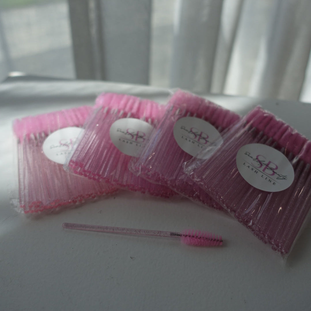 Lash Wands are an essential tool for lash artists and clients, designed to gently brush and maintain lash extensions.