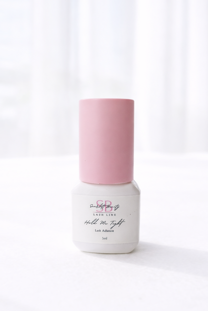 Hold Me Tight Adhesive is a professional lash extension glue designed for lash artists who want speed, reliability, and long-lasting retention.