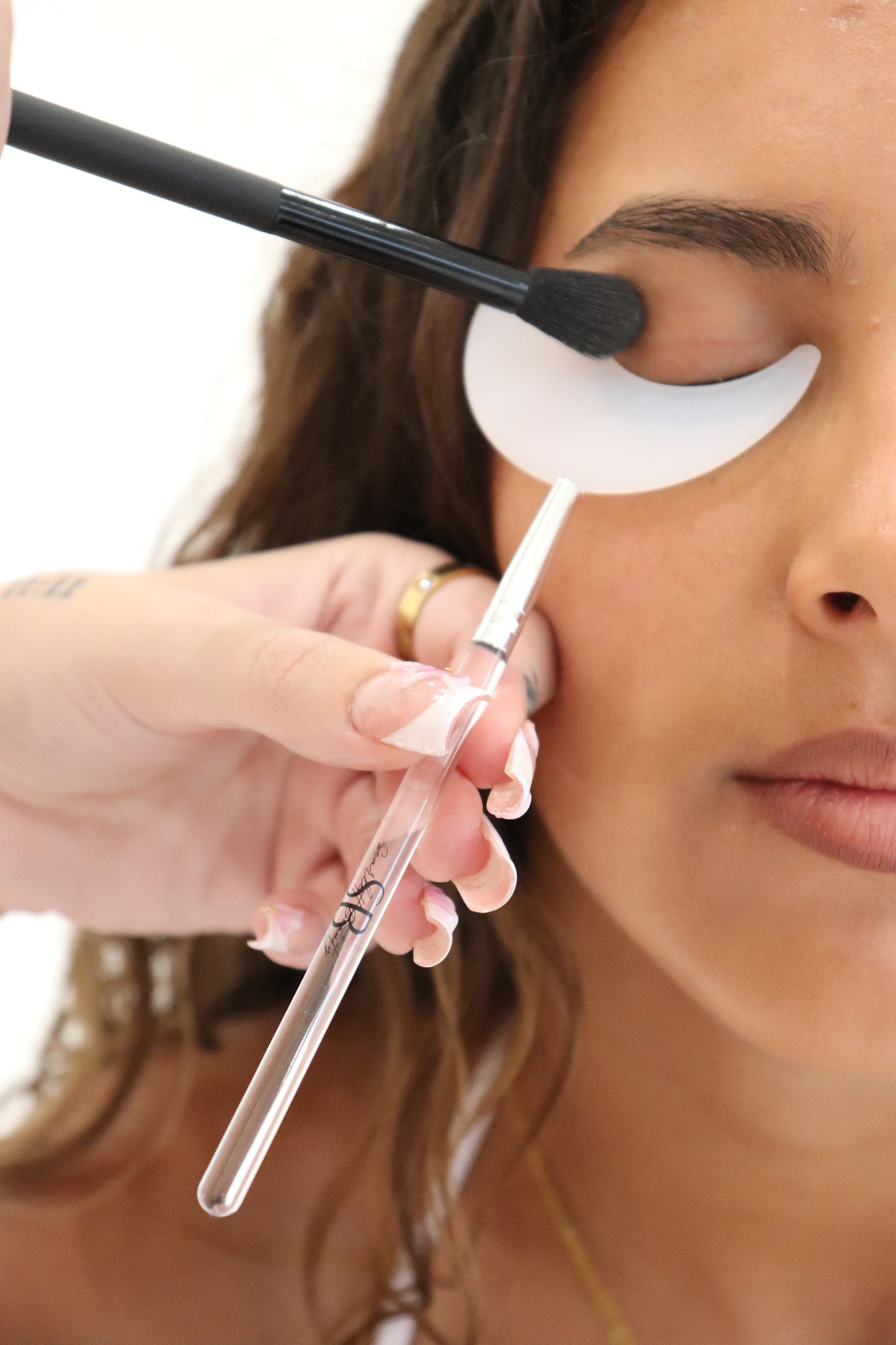 lash shields protecting lash extensions during eye makeup application